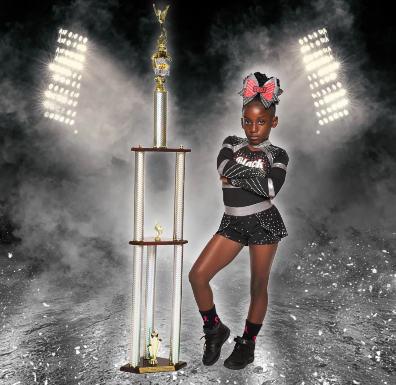 Black Diamonds cheerleader with trophy